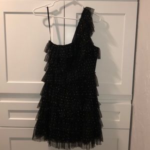 Black one shoulder dress with gold sparkle dots